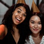 women-taking-selfie-new-year-s-eve-party.jpg